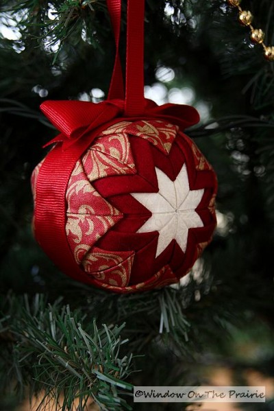 Putting Ornaments On The Tree – Window On The Prairie
